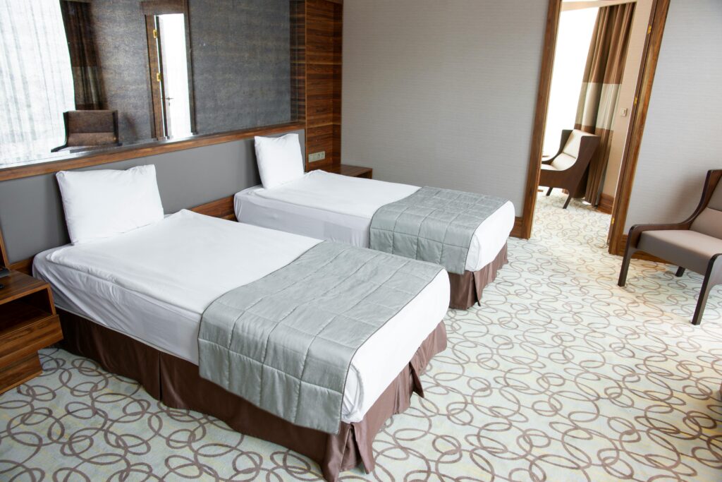 <img loading= alt="Well-furnished AC guesthouse at BTS Conventions, Vijayawada – Comfortable stay for wedding guests and family functions"