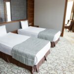 alt="Well-furnished AC guesthouse at BTS Conventions, Vijayawada – Comfortable stay for wedding guests and family functions"