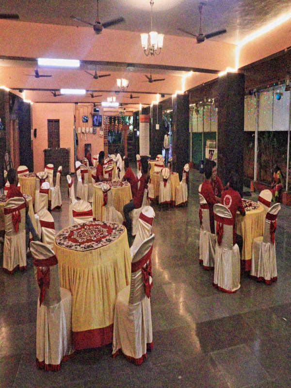 <img loading= alt="BTS Conventions, Kalyanamandapam Road, RR Nagar, Vijayawada – Luxurious AC banquet hall with guesthouse for weddings, birthdays, engagements, retirement, and farewell functions"